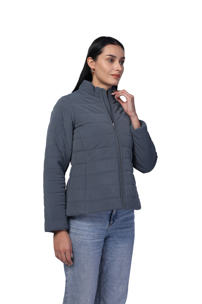 A model showcasing Women Quilted Jacket In Velvet Fabric With Concealed Zipper Pocket thumbnail.